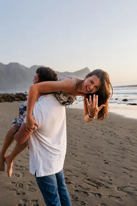 Family photographed together on the beach